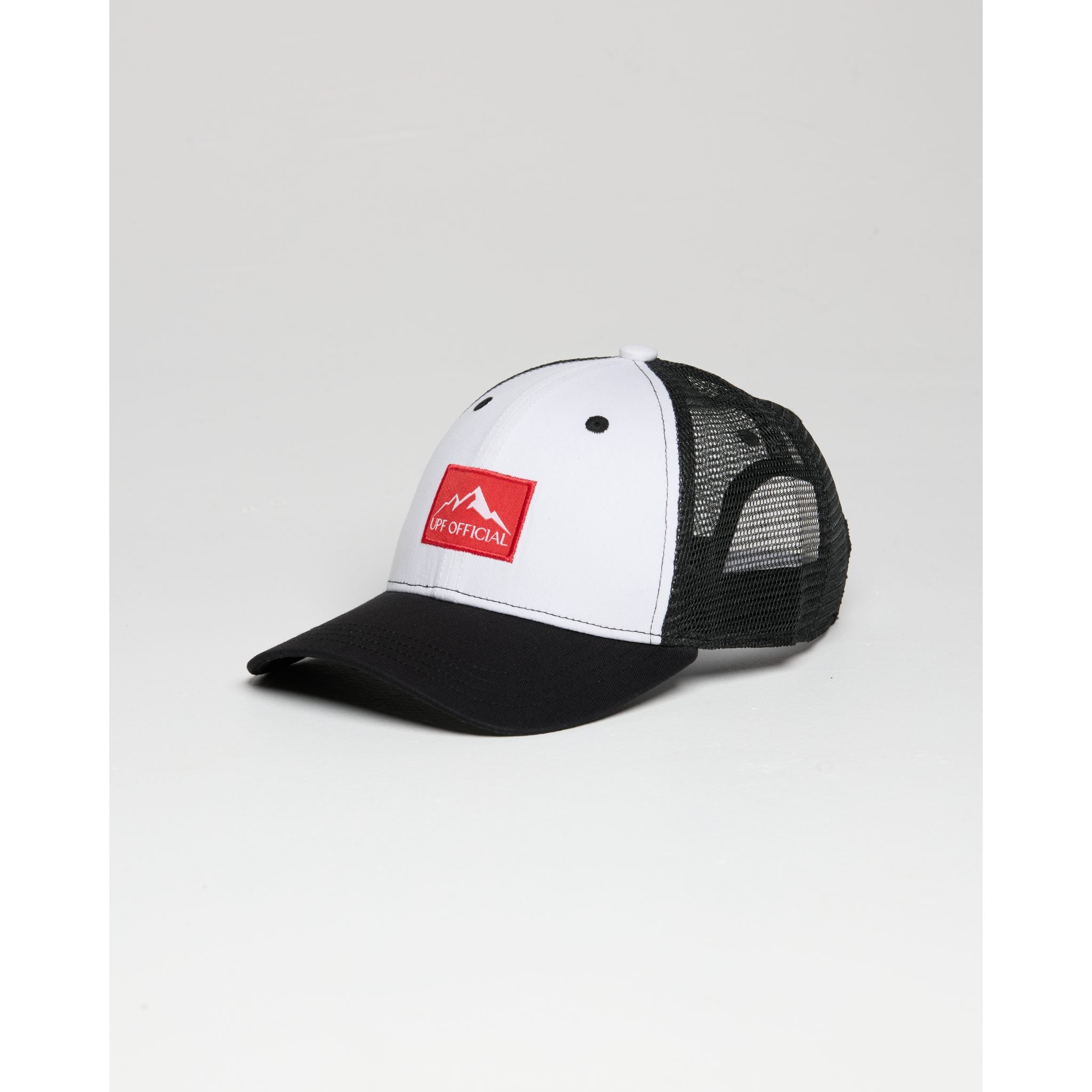Black and white cap with a red woven logo and snapback closure