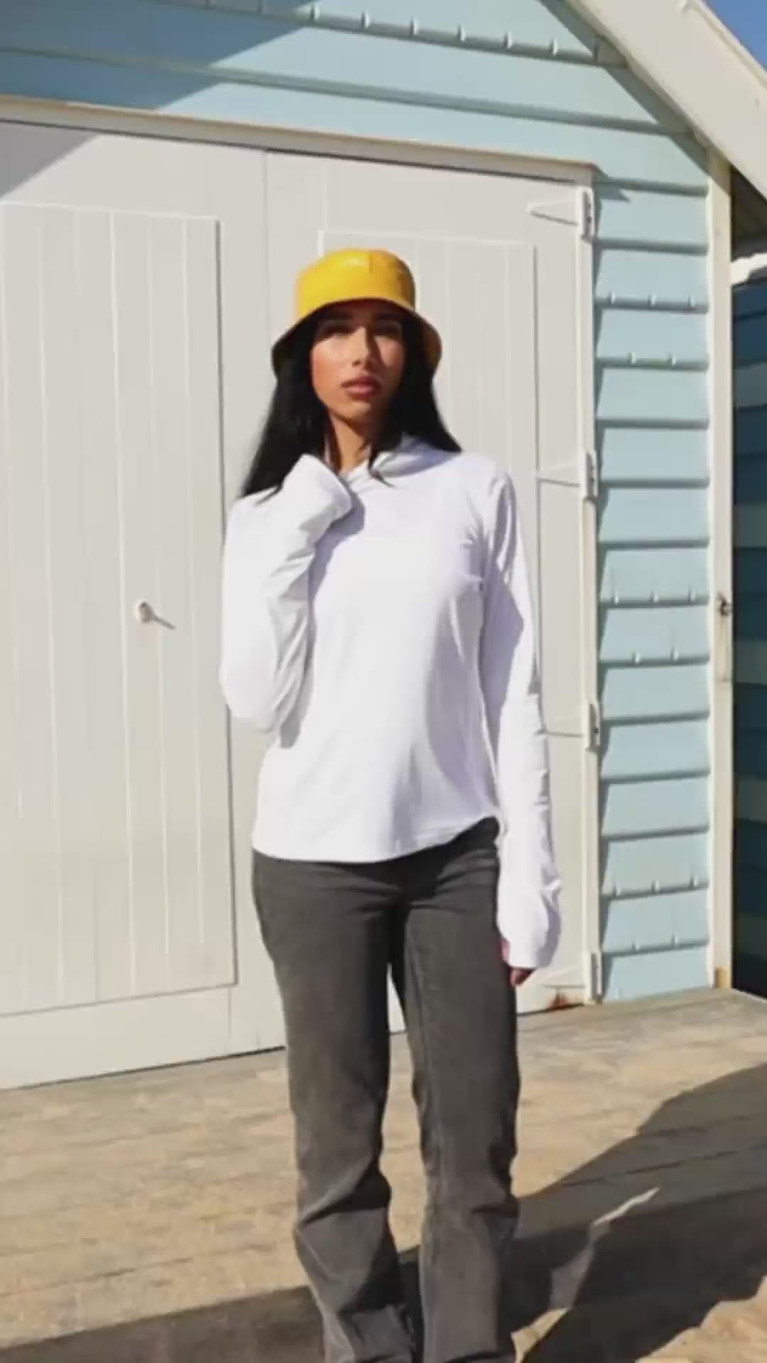 UPF Official branded hero video featuring a female model posing confidently in premium apparel, accompanied by a cool, modern soundtrack.