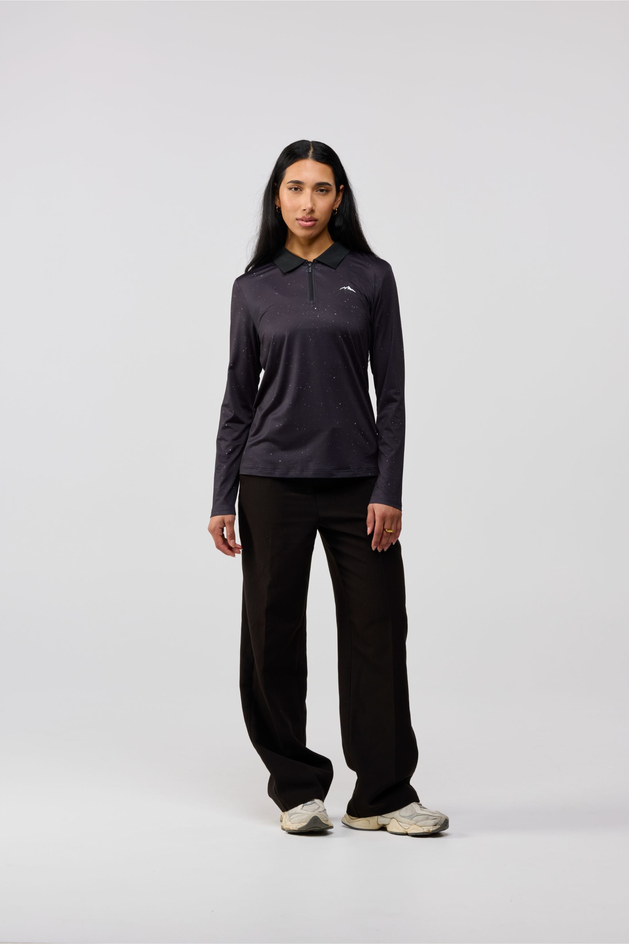 Front view of black Solar Line polo shirt with minimal front design, premium.