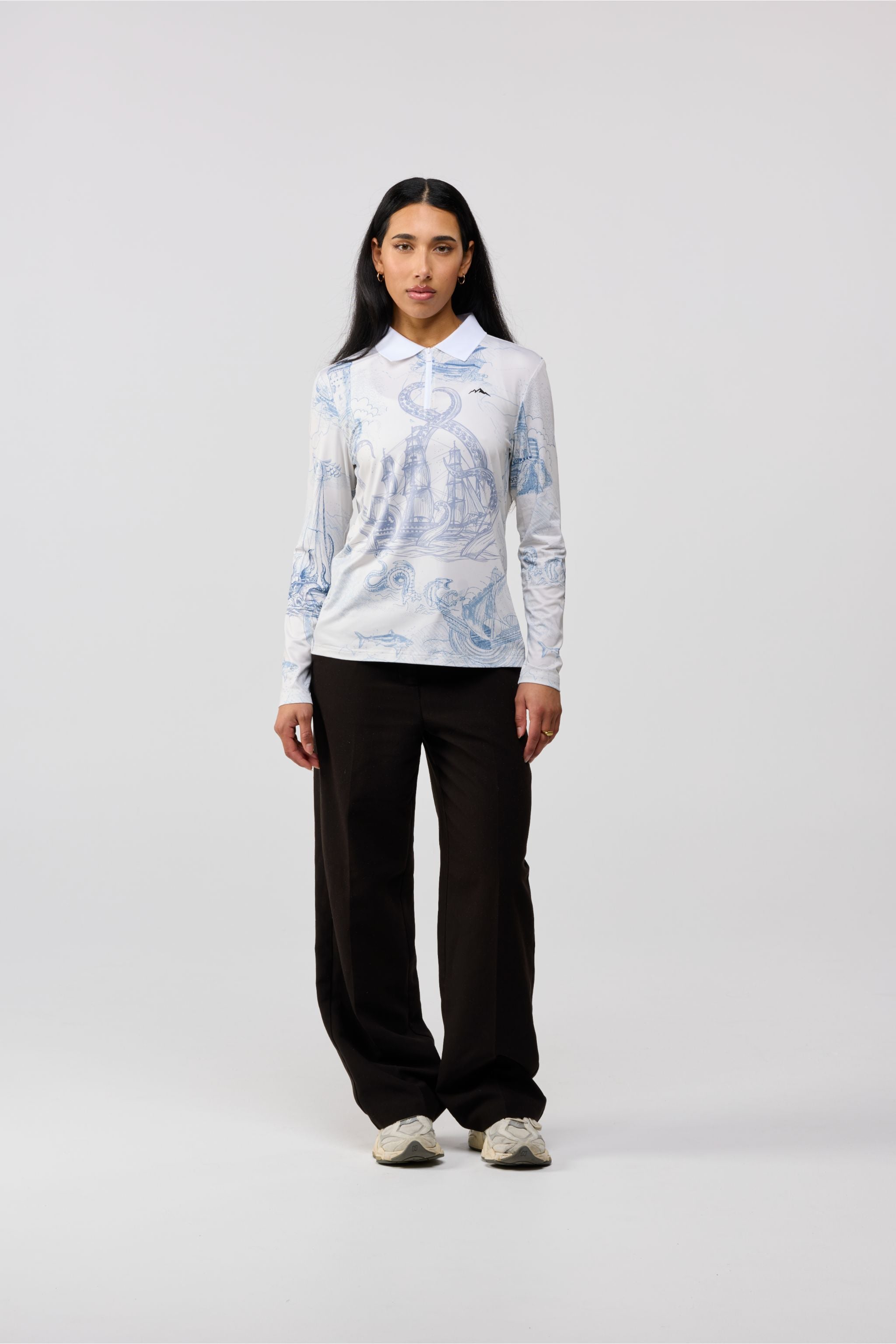 Front view of women’s Kraken Domain white t-shirt with minimal blue kraken design.
